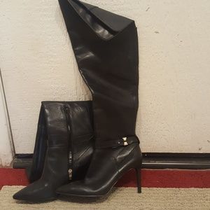 Knee high black leather boots